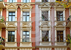 Windows of two rehabilitated townhouses