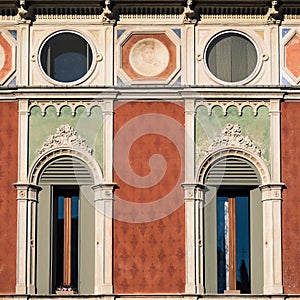 Windows in Venetian Gothic style.