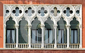Windows in Venetian Gothic style.
