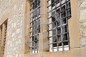 Windows with metal grilles