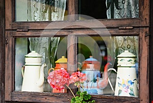 Windows of a wooden cottage