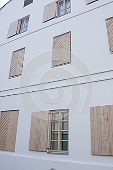 Windows with wooden covers