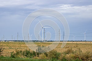 Windpower and agriculture. Wind turbines for electricity generation.