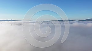 Windpower turbines in the fog in County Donegal - Ireland