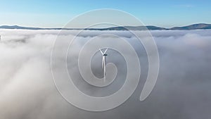 Windpower turbines in the fog in County Donegal - Ireland