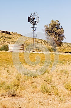 Windpump and dam in the Kalahari desert