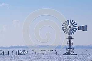 Windpump in winter landscape