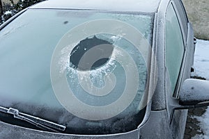 Windscreen with peephole