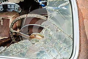 Windshield on Abandoned Car in Junkyard