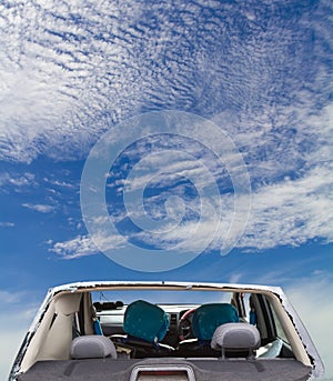 Windshield broken cloud sky.