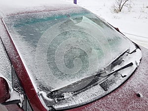 The windshield of the car in ice.