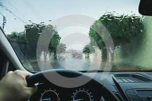 Windshield of a car wet by the rain