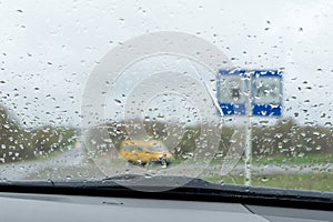 Windshield in the rain drops