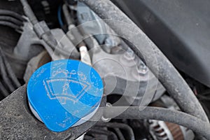 Windshield washer fluid blue storage cap