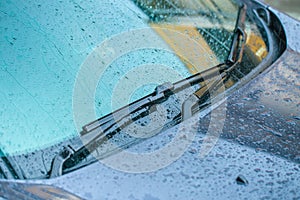 Windshield wiper with rain drop.