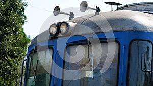 Windshield wipers, headlights and horoscop on a locomotive photo