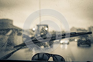 Windshield wipers from inside of car, season rain