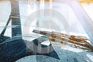 Windshield wipers from inside of car, season rain