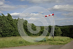 Windsock blown by the wind on the field