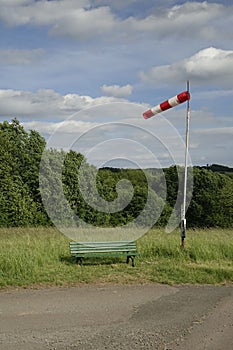 Windsock blown by the wind on the field