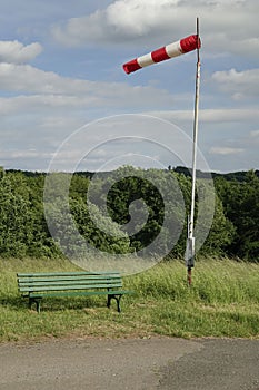 Windsock blown by the wind on the field