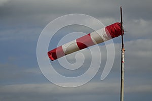 Windsock blown by the wind on the field