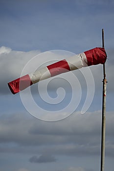 Windsock blown by the wind on the field