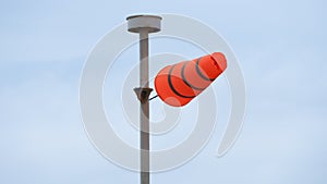 Windsock indicator of wind on tank chemical cone indicating wind direction and force.