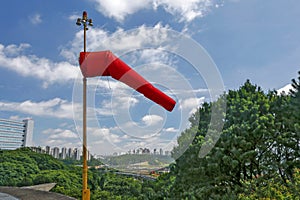 Red windsock inflated of air photo