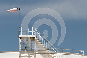 Windsock on oil storage tank