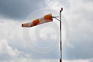 Windsock with overcast sky