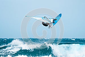 Windsurf jumps out of the water