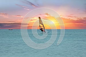 Windsurfer at Aruba island on the Caribbean Sea at a beautiful s