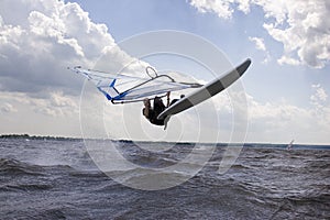 Windsurfer doing a nose landing
