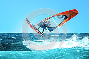 Windsurfer jumping in the waves in the Atlantic Ocean