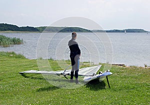 Windsurfer by lake