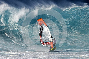 Windsurfer and large wave