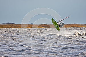 Windsurfing jump on a lake