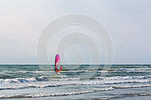 Windsurfer on the sea in daylight