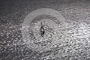 Windsurfer silhouette on the backlight