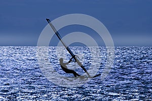 WINDSURFER after sunset.