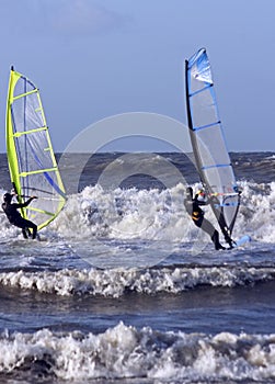 Windsurfers surfing on the north sea in Netherland