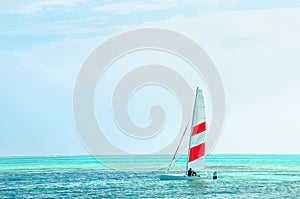 Windsurfing board against the azure water of the Indian Ocean, Maldives