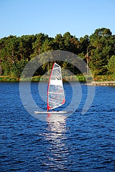 Windsurfing on a lake