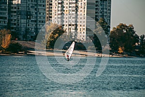 Windsurfing on the lake in Autumn