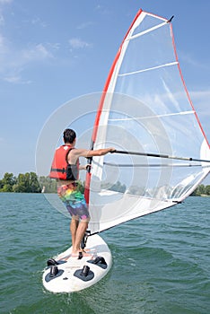 Windsurfing on a lake
