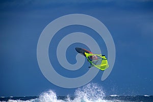 Windsurfing move - one handed back loop in El Cabezo, Tenerife, Spain