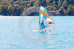 Windsurfing. A water sportsman on a sailboard
