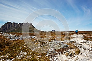 Windswept hikers on the desolate Overland Trail, Tasmania