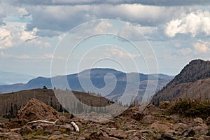 Windswept Mountain Top with Storm Clouds photo